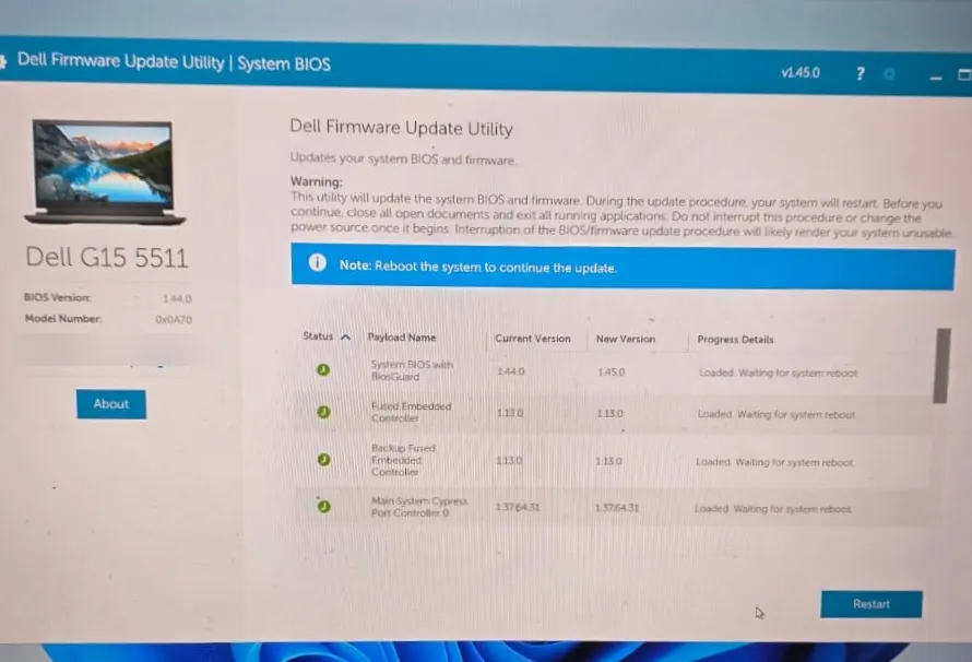 Utilitário de atualização de firmware da Dell no G15 5511 listando a BIOS do sistema, da versão 1.44.0 para a 1.45.0, com o botão Restart